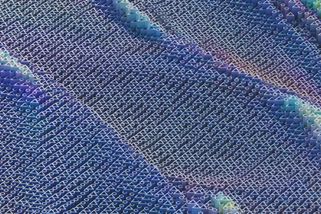 Image showing a blue weave of programming code.
